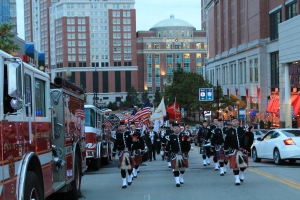 Local Fire Departments join to provide pipe and drum escorts to burn survivors, family members and other attendees of WBC 2013